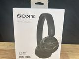 the box of the sony headphones is open on the table