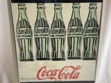 une image représentant des bouteilles de Coca-Cola sur fond blanc