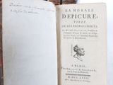 an open book with a picture of a man on it
