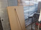 a pile of cardboard in the middle of a room