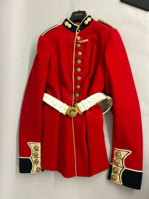 an image of a red uniform with gold buttons and a white belt