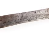 a knife that is laying on a white surface