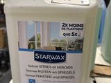 un gallon de Starwax posé sur une table