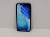 the back of a black iphone with a blue screen sitting on a white surface