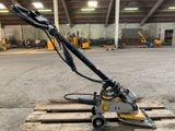 a close up of a fork on a pallet in a warehouse