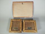 pair of antique wooden picture frames with gold trims