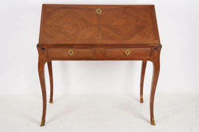 a small wooden desk with drawers and a drawer underneath it