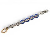 a close up of a blue and silver chain bracelet on a white background