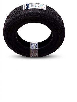 a close up of a tire on a white surface with a sticker on it