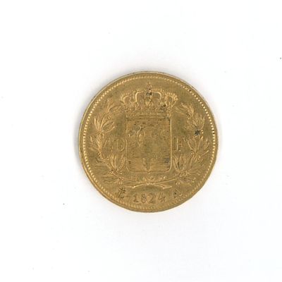 l'image d'une pièce d'or sur laquelle figurent des armoiries