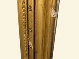 a gold vase with a clock on the top of it