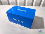a blue box sitting on top of a white table