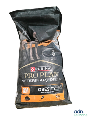 a bag of dog food sitting on a white surface