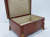 a wooden box with a lid that is open