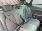 a seat belt that is attached to the back of a car
