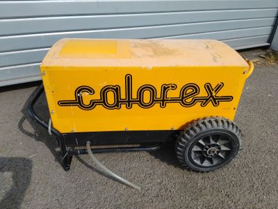 a yellow box with a black wheel on it