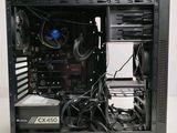 a black computer case with a lot of wires on it