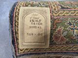 a close up of a rug with a label on it