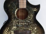 a black guitar with a design on it on a white background