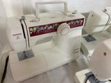 a picture of a sewing machine sitting on a table