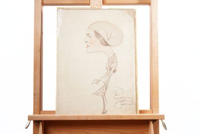 a drawing of a woman in a hat on a easel