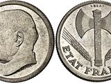 an image of a coin with a man ' s head and a hammer on it