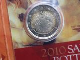 a picture of a silver coin on display in a box