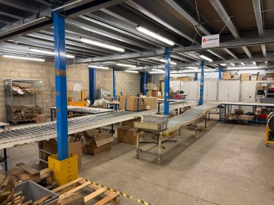 a large room with a lot of tables and chairs