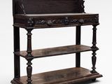 an old wooden shelf with three shelves on top of it