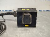 a close up of a machine with a cord attached to it