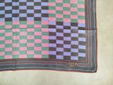 a picture of a square scarf with a checkered pattern