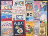 many children ' s books on display on a table
