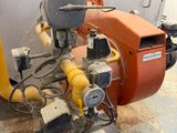 a machine that is sitting on the floor in a room