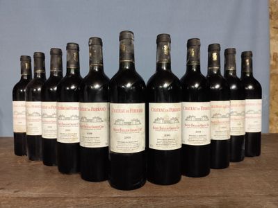 six bottles of red wine are lined up on a wooden table