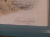 a picture of a man riding a horse on the beach