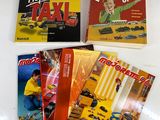 quatre livres pour enfants exposés dans un plateau blanc