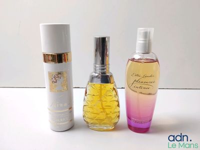 three different types of perfumes on a white table