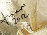 a piece of foil that has writing on it