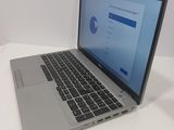 a laptop computer that is sitting on a table