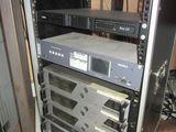 an image of a rack of electronic equipment in a room