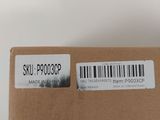 a box with a sticker on it sitting on top of a table