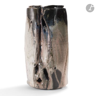 a close up of a vase with a black and white design