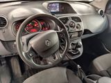 a dashboard of a small car with a steering wheel