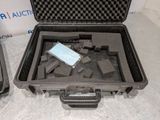two pieces of plastic in a case on a table