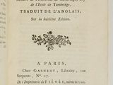 an open book with a black and white title on it
