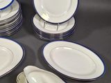 a lot of plates that are sitting on a table