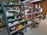a room with a lot of items on the shelves