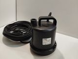 an image of a black water pump on a white counter