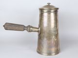 an old silver coffee pot with a wooden handle on a white background