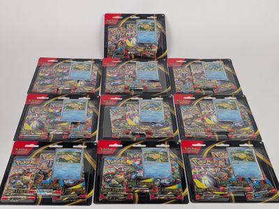 six cartes à collectionner Pokémon sont empilées les unes sur les autres
